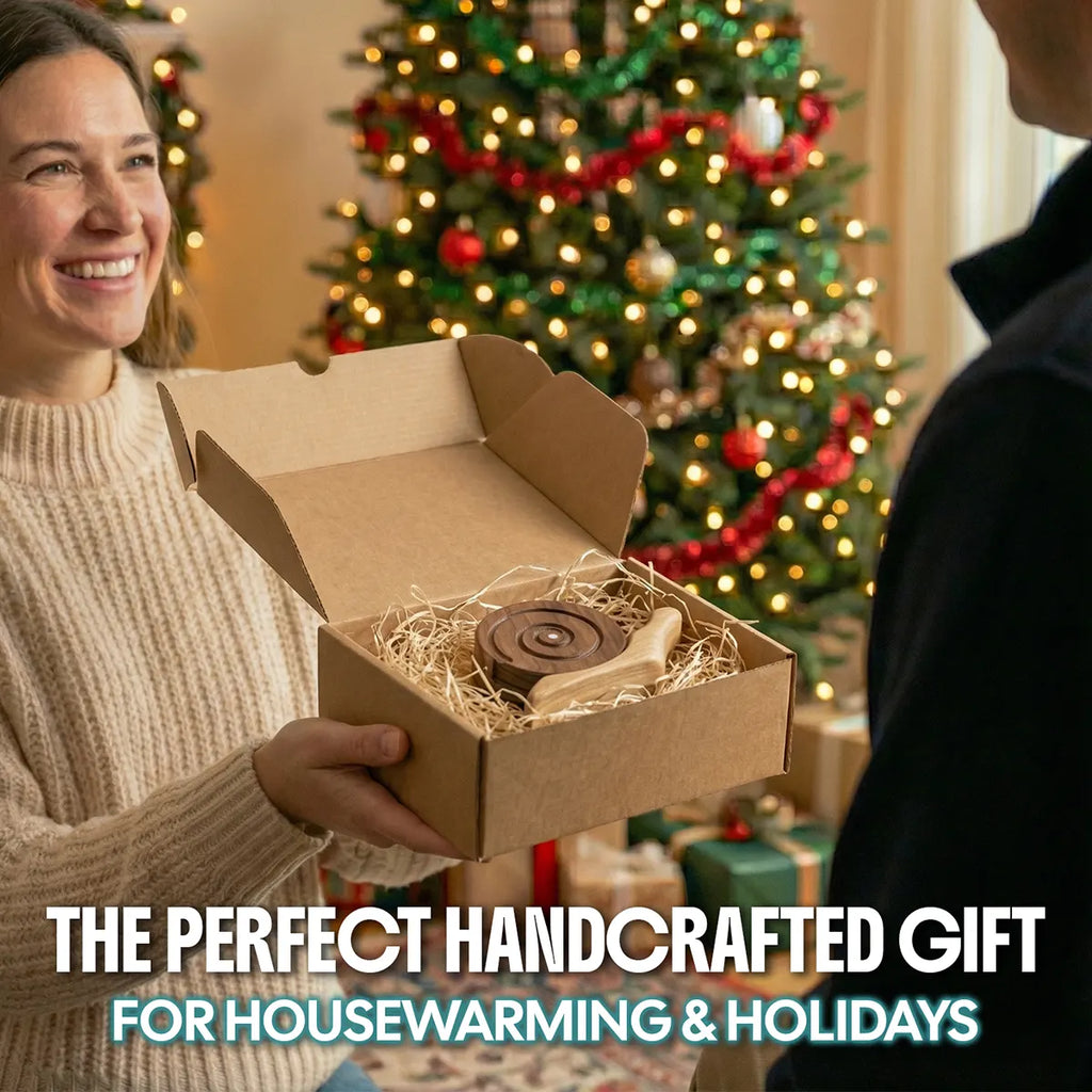 Woman presenting a kraft gift box containing BeeRusty wooden snail coasters to a man near a Christmas tree. Text highlights it as 'The Perfect Handcrafted Gift for Housewarming & Holidays'