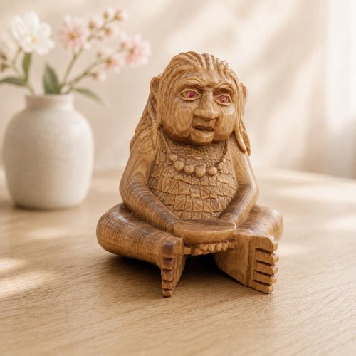 Custom hand-carved wooden seated figure sculpture