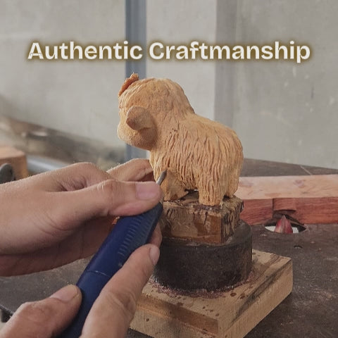 Close-up video showing the artisan hand-carving process of a BeeRusty wooden Highland Cow figurine. The artist uses tools to create detailed fur texture on the solid wood sculpture, proving authentic craftsmanship